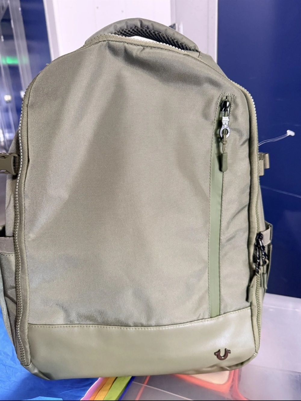 True Religion Dome Backpack in olive green.